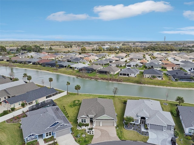 aerial view featuring a residential view and a water view