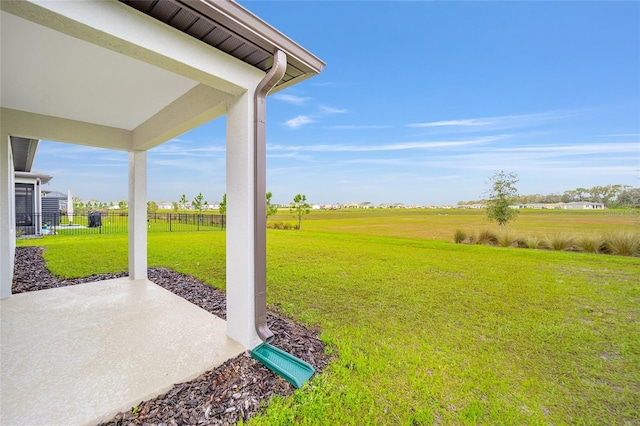 view of yard featuring a patio area and fence