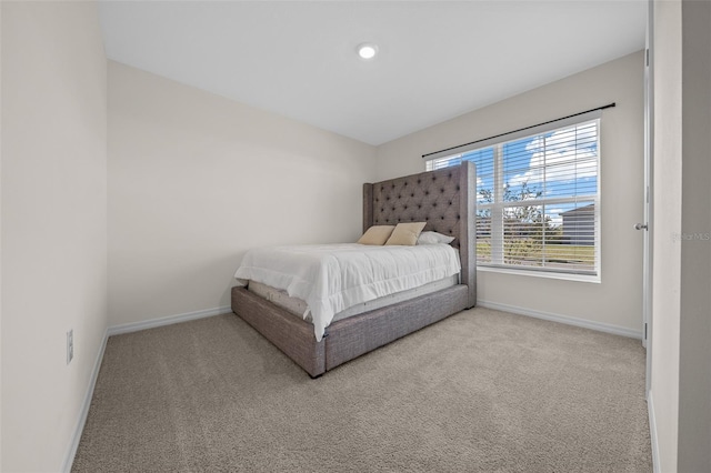 4931 SW 88th Pl, Ocala, FL 34476 - bedroom featuring baseboards and carpet floors