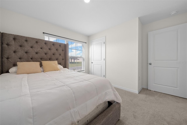 4931 SW 88th Pl, Ocala, FL 34476 - bedroom with light colored carpet and baseboards