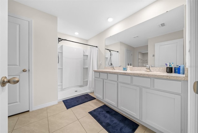 4931 SW 88th Pl, Ocala, FL 34476 - full bathroom with visible vents, a sink, a shower with shower curtain, tile patterned flooring, and double vanity