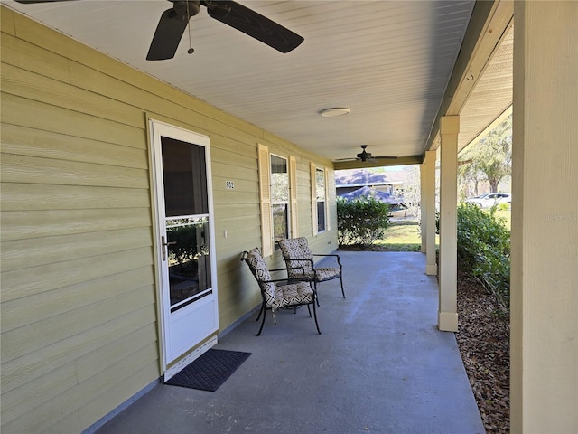 view of patio / terrace featuring a porch and a ceiling fan