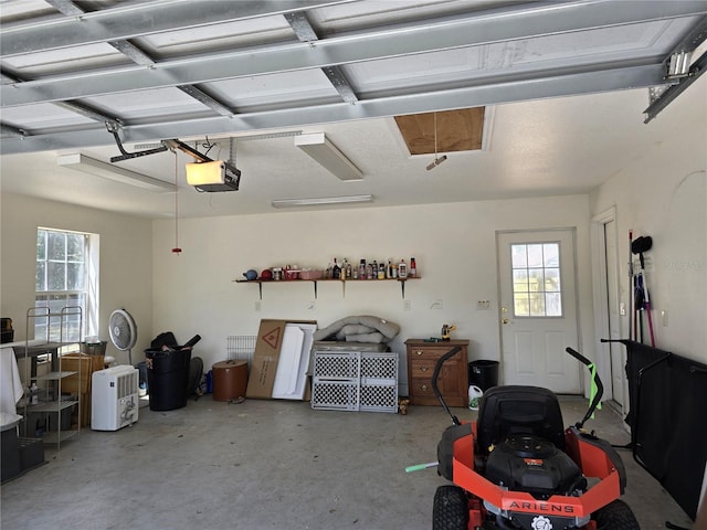 garage featuring a garage door opener