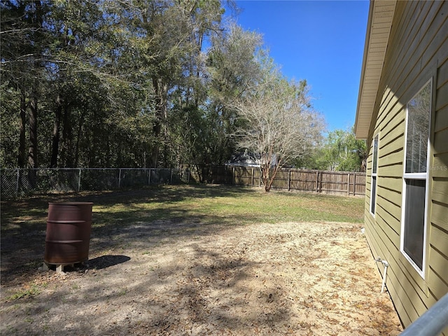 view of yard featuring a fenced backyard