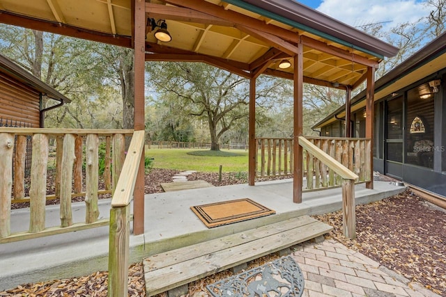 view of patio / terrace featuring fence