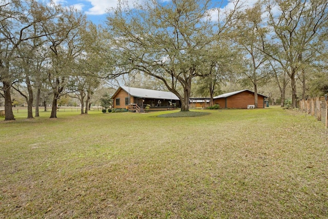 view of yard featuring fence