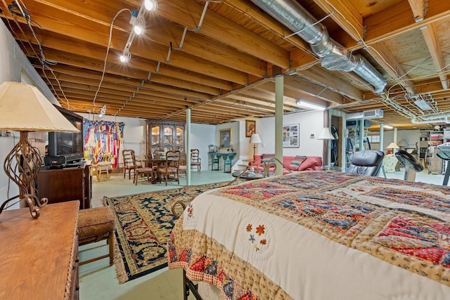 bedroom with concrete flooring