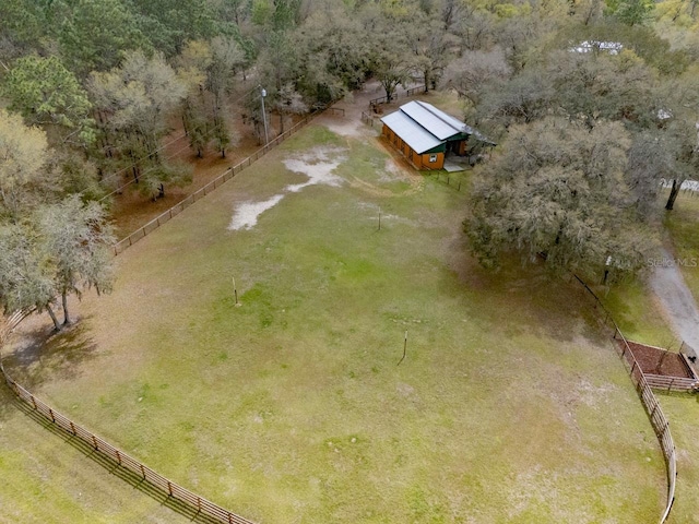 birds eye view of property featuring a rural view