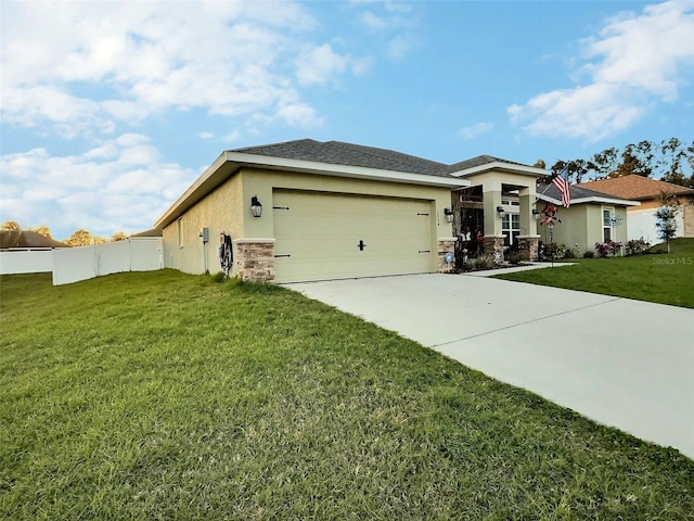 prairie-style home featuring a front yard, stucco siding, concrete driveway, a garage, and stone siding