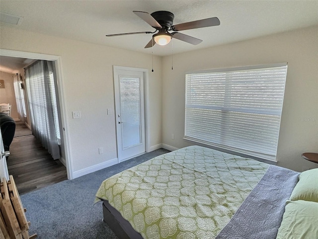 bedroom with baseboards, carpet, and ceiling fan