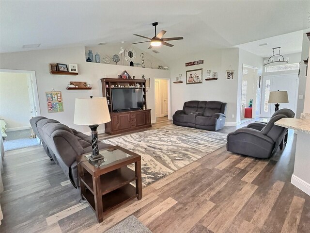 1034 SE 65th Cir, Ocala, FL 34472 - living area featuring ceiling fan, wood finished floors, and vaulted ceiling