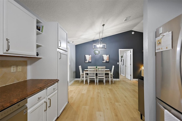 kitchen featuring open shelves, light wood-style flooring, white cabinets, and appliances with stainless steel finishes