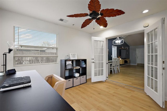 office featuring visible vents, light wood-style flooring, recessed lighting, french doors, and ceiling fan