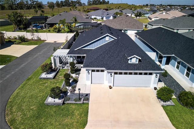 drone / aerial view with a residential view