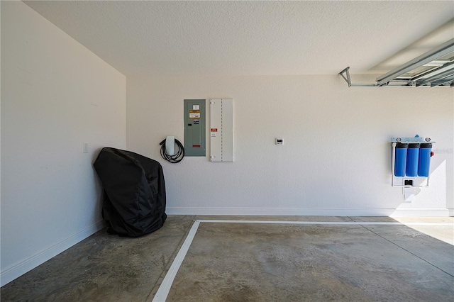 7014 Elaine Ct, The Villages, FL 34762 - garage with electric panel and baseboards