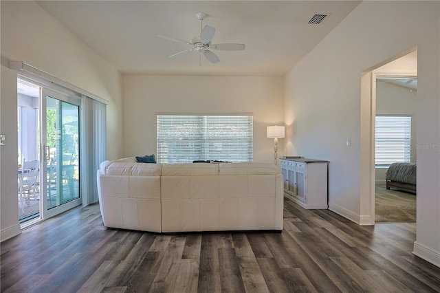 7014 Elaine Ct, The Villages, FL 34762 - living room with plenty of natural light, dark wood-style floors, and visible vents