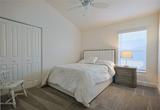 7014 Elaine Ct, The Villages, FL 34762 - bedroom with baseboards, ceiling fan, light colored carpet, vaulted ceiling, and a closet