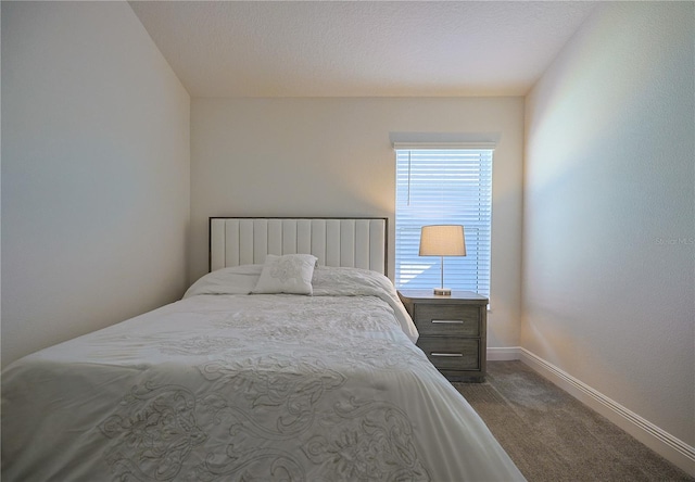 7014 Elaine Ct, The Villages, FL 34762 - bedroom featuring dark carpet and baseboards