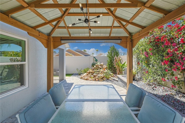7014 Elaine Ct, The Villages, FL 34762 - view of patio featuring a gazebo, a fenced backyard, and an outdoor living space