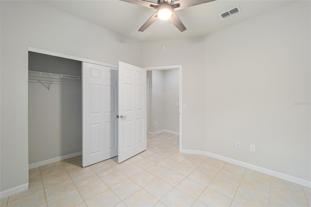 unfurnished bedroom featuring visible vents, baseboards, a closet, and a ceiling fan