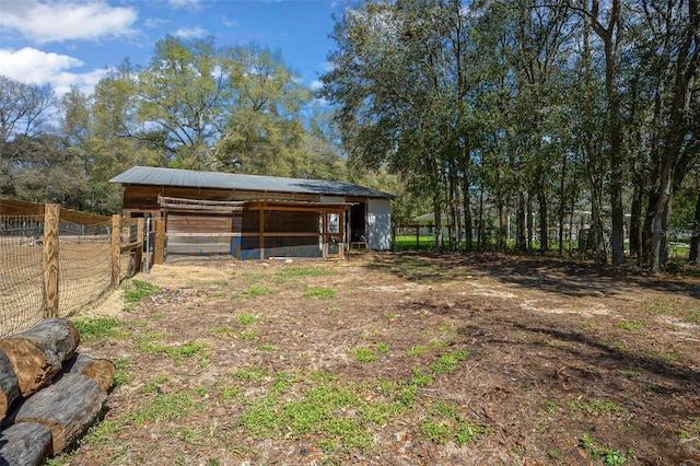 view of outbuilding featuring an outbuilding