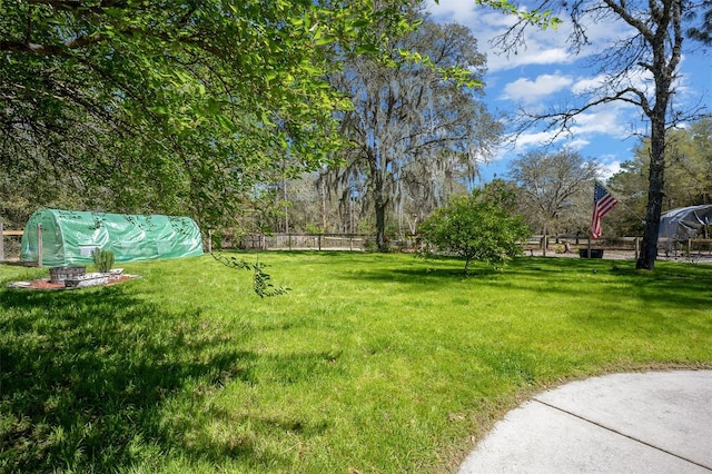 view of yard featuring fence