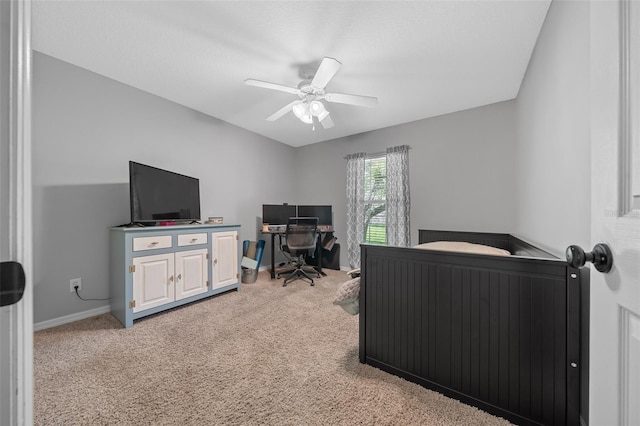 bedroom with baseboards, light colored carpet, and ceiling fan