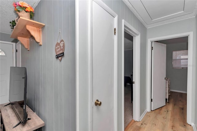 corridor featuring light wood-style flooring