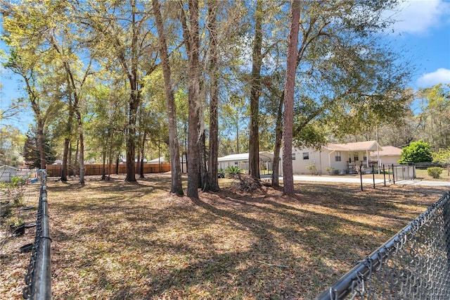 view of yard with a gate and fence