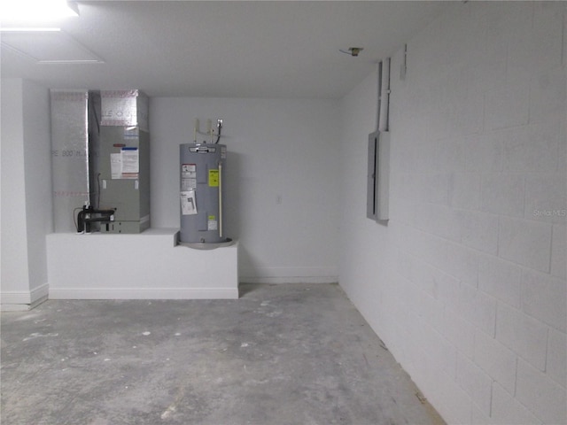 interior space featuring heating unit, water heater, and electric panel