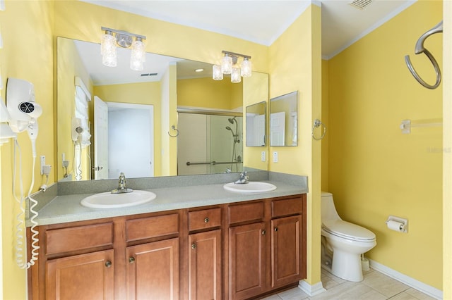 full bath with visible vents, a stall shower, toilet, and a sink