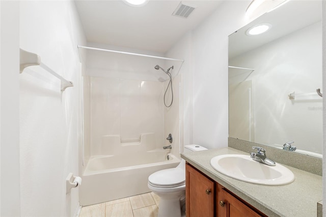 full bath featuring vanity, toilet, bathtub / shower combination, and visible vents