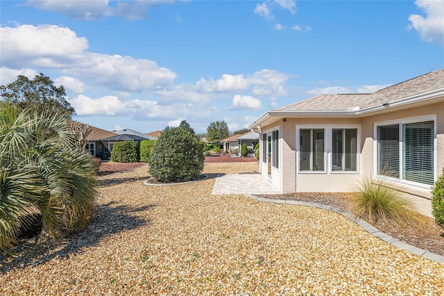 view of yard with a patio area