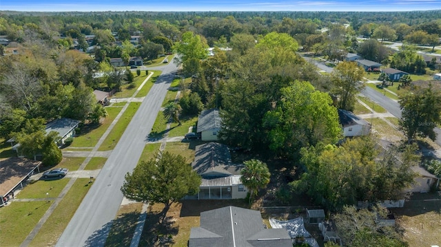 drone / aerial view featuring a forest view