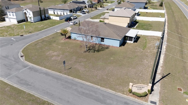 drone / aerial view with a residential view