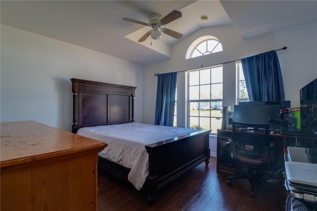 bedroom with lofted ceiling, a ceiling fan, and dark wood-style flooring