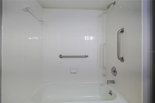 bathroom featuring  shower combination