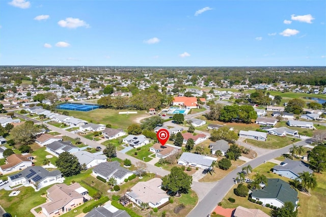 birds eye view of property with a residential view