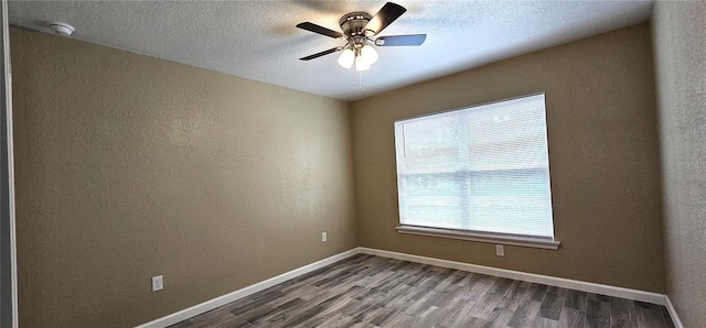 5975 NW 6th Pl, Ocala, FL 34482 - spare room featuring baseboards, a textured wall, and wood finished floors