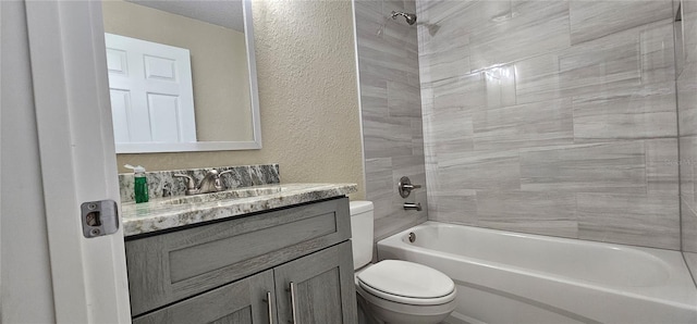 5975 NW 6th Pl, Ocala, FL 34482 - full bathroom featuring a textured wall, toilet, vanity, and washtub / shower combination