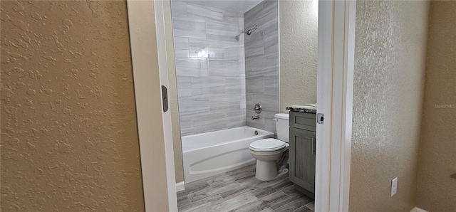 5975 NW 6th Pl, Ocala, FL 34482 - full bath with toilet, vanity, a textured wall, and wood finished floors