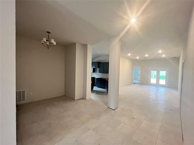 4365 SW 90th Pl, Ocala, FL 34476 - spare room featuring a chandelier, vaulted ceiling, and recessed lighting