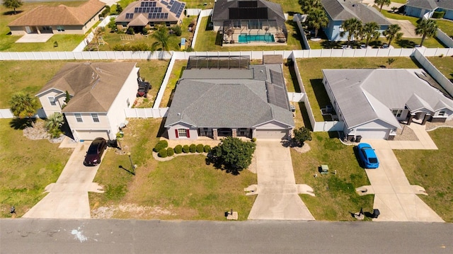 birds eye view of property with a residential view