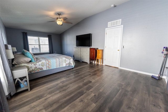 bedroom with a ceiling fan, baseboards, visible vents, dark wood finished floors, and vaulted ceiling