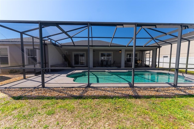 view of swimming pool featuring a lanai, a fenced in pool, and a patio