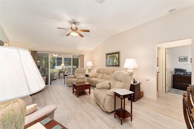 living room featuring baseboards, ceiling fan, vaulted ceiling, and light wood-style floors
