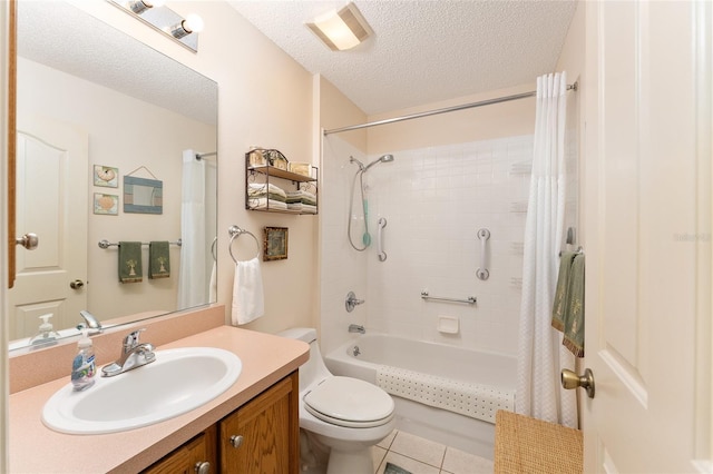 full bath featuring toilet, vanity, a textured ceiling, shower / tub combo, and tile patterned flooring