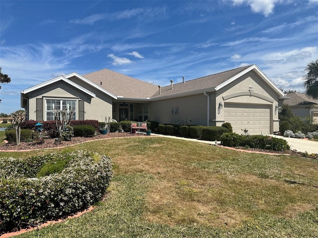 single story home featuring a front lawn, concrete driveway, a garage, and stucco siding
