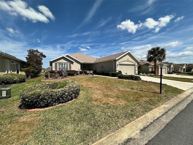 ranch-style house with a garage, a front lawn, driveway, and stucco siding