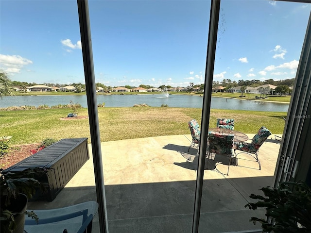 view of patio featuring a water view